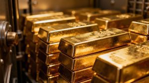 Gold bars stacked in a vault